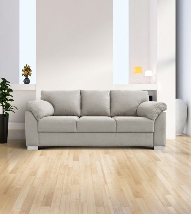 Light grey sofa in a modern living room illustrating in-stock and made-to-order sofa choices