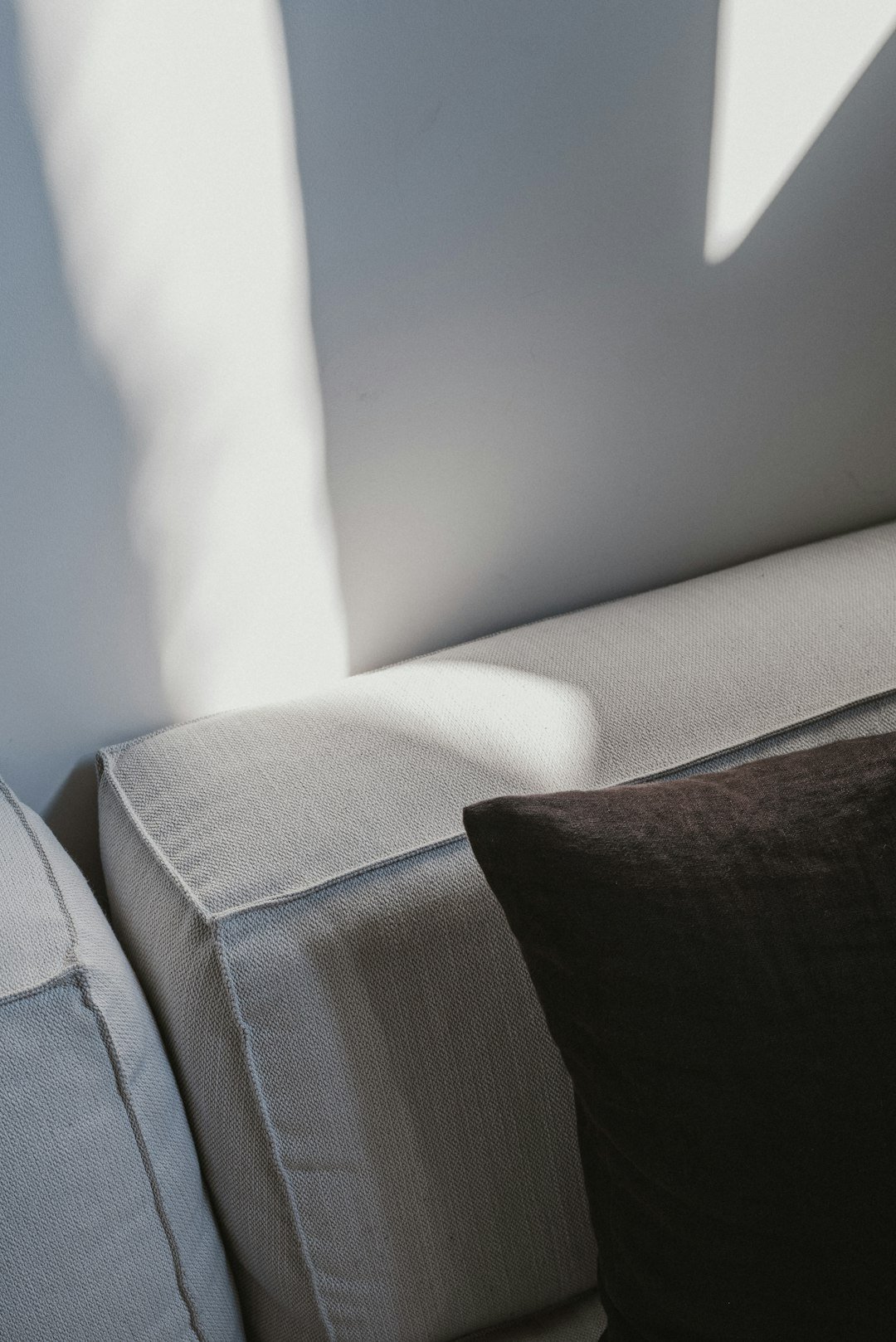 Modern neutral sofa illustrating sofa warranty and guarantee buying checks